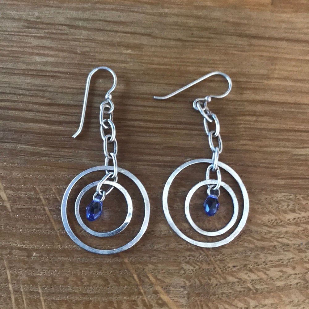 Sterling earrings with violet stone.